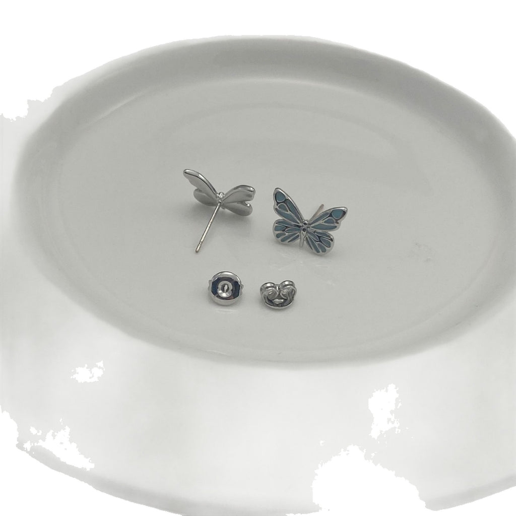 Boucles d'oreilles élégantes en argent avec pendentif papillon lumineux