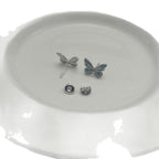 Boucles d'oreilles élégantes en argent avec pendentif papillon lumineux